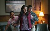 From left, Stephanie Hsu, Michelle Yeoh and Ke Huy Quan in a scene from, 'Everything Everywhere All At Once.' (Allyson Riggs/ A24 Films via AP)