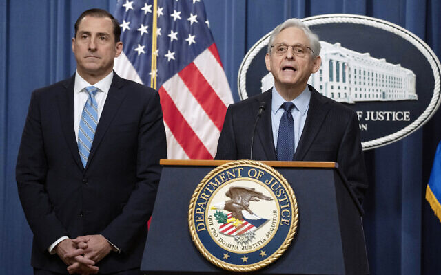 US Attorney General Merrick Garland speaks during a news conference at the Department of Justice, January 12, 2023, in Washington, as John Lausch, the US Attorney in Chicago, looks on. (AP Photo/Manuel Balce Ceneta)