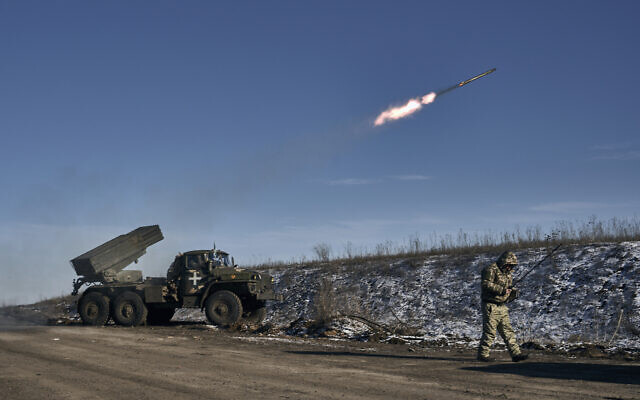 Ukrainian army Grad multiple rocket launcher fires rockets at Russian positions in the frontline near Soledar, Donetsk region, Ukraine, January 11, 2023. (AP Photo/Libkos)