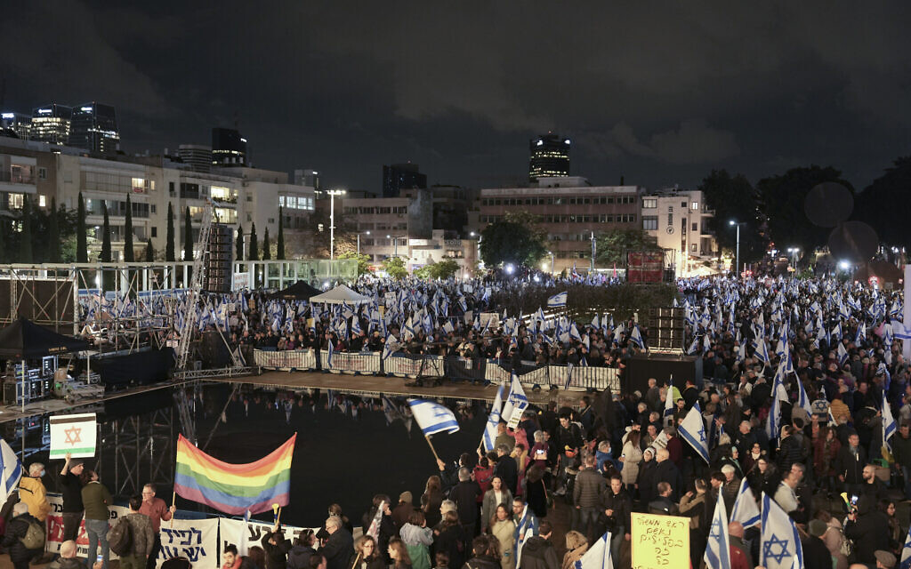 Israelis protest against sweeping proposals to overhaul Israel's legal and judicial system in Tel Aviv, on January 14, 2023. (AP Photo/Oded Balilty)