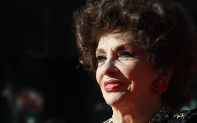 Italian actress and United Nations Food and Agriculture Organization (FAO) goodwill ambassador Gina Lollobrigida poses on the red carpet, on the occasion of World Food Day, at the 4th edition of the Rome Film Festival, in Rome, October 16, 2009.  (AP Photo/Alessandra Tarantino, File)