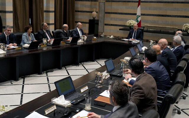 Lebanese caretaker Prime Minister Najib Mikati, center right, heads the cabinet meeting in Beirut, Lebanon, Wednesday, Jan. 18, 2023 (AP Photo/Bilal Hussein)