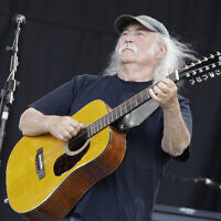 File: David Crosby of the band Crosby, Stills and Nash, performs at Glastonbury Festival in England, on June 27, 2009.  His death was reported Thursday, Jan. 19, 2023, at age 81. (AP/Joel Ryan)