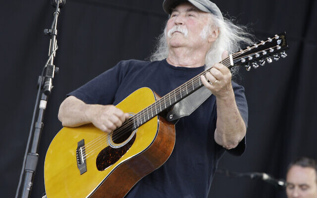 File: David Crosby of the band Crosby, Stills and Nash, performs at Glastonbury Festival in England, on June 27, 2009.  His death was reported Thursday, Jan. 19, 2023, at age 81. (AP/Joel Ryan)