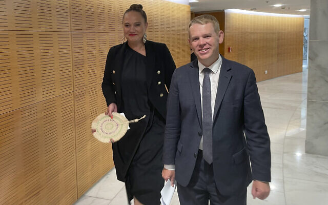 Incoming New Zealand prime minister Chris Hipkins (right) and his incoming deputy Carmel Sepuloni arrive for a press conference at Parliament in Wellington, January 22, 2023. (AP/Nick Perry)