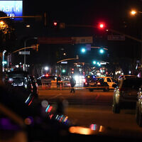 Police investigate a scene where a shooting took place in Monterey Park, Calif., January 22, 2023. (AP Photo/Jae C. Hong)