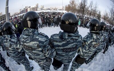 Police block a protest against the jailing of opposition leader Alexei Navalny in Yekaterinburg, Russia, Jan. 23, 2021. (AP Photo/Anton Basanayev, file)