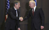 US Secretary of State Antony Blinken, left, shakes hands with Defense Minister Yoav Gallant in Jerusalem, Jan. 31, 2023. (Ronaldo Schemidt/Pool Photo via AP)
