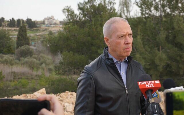 Defense Minister Yoav Gallant speaks to reporters after an assessment at the IDF's West Bank headquarters, January 29, 2023. (Emanuel Fabian/Times of Israel)