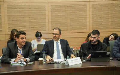 Deputy Attorney General Gil Limon (center) speaks at a meeting of the Knesset Constitution, Law and Justice Committee on January 16, 2023. (Dani Shem-Tov/Knesset)