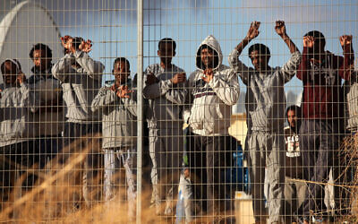 African migrants protest at the Holot detention center near Ktsiot, in the Negev Desert, southern Israel, February 17, 2014. (FLASH90)