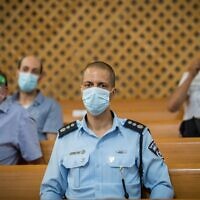 Police Commander Kobi Yaakobi, in a maske due to the COVID-19 pandemic, at a court hearing for a petition filed by local residents to cancel demonstrations in front of the official residence of then-prime minister Benjamin Netanyahu at the Supreme Court in Jerusalem on August 16, 2020. (Yonatan Sindel/Flash90