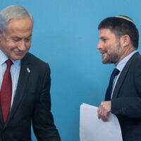 Prime Minister Benjamin Netanyahu and Minister of Finance Bezalel Smotrich at a press conference at the Prime Minister's Office in Jerusalem, on January 25, 2023. (Yonatan Sindel/Flash90)