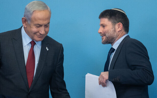 Prime Minister Benjamin Netanyahu and Minister of Finance Bezalel Smotrich at a press conference at the Prime Minister's office in Jerusalem, on January 25, 2023. (Yonatan Sindel/Flash90)