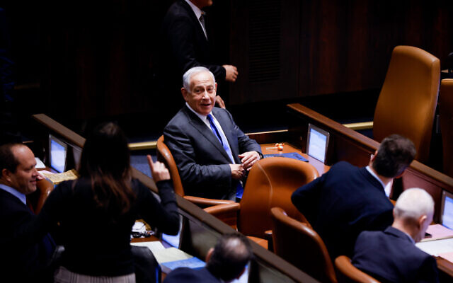 Incoming Benjamin Netanyahu with fellow Likud MKs in the Knesset, December 28, 2022. (Olivier Fitoussi/Flash90)