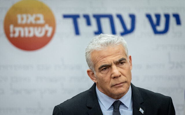 Yesh Atid party leader Yair Lapid speaks during a faction meeting at the Knesset on January 2, 2023. (Yonatan Sindel/Flash90)