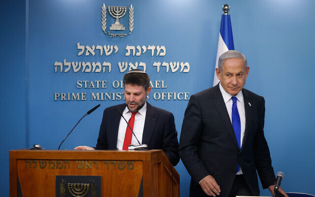 Prime Minister Benjamin Netanyahu gives a press conference with Finance Minister Bezalel Smotrich at the Prime Minister's Office in Jerusalem, on January 11, 2023. (Olivier Fitoussi/Flash90)