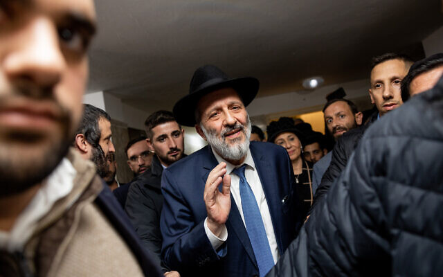 Health and interior minister Aryeh Deri outside his home in Jerusalem on January 18, 2023 (Courtesy Yonatan Sindel/Flash90)