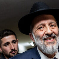 Shas chief Aryeh Deri outside his home in Jerusalem on January 18, 2023, hours after the High Court ruled he cannot serve as a government minister. (Yonatan Sindel/Flash90)