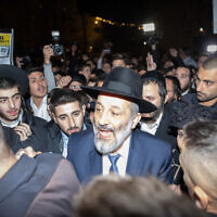 Shas chief Aryeh Deri seen outside his home in Jerusalem on January 18, 2023, hours after the High Court ruled he cannot serve as minister. (Yonatan Sindel/Flash90)