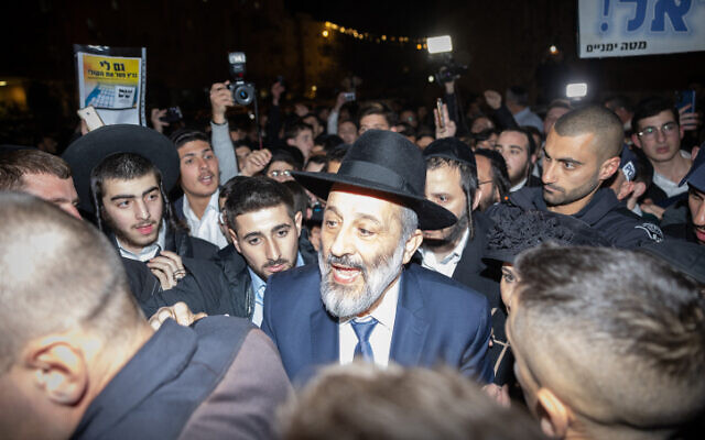 Shas chief Aryeh Deri seen outside his home in Jerusalem on January 18, 2023, hours after the High Court ruled he cannot serve as minister since his recent criminal conviction made his appointment as cabinet minister "unreasonable in the extreme." (Yonatan Sindel/Flash90)