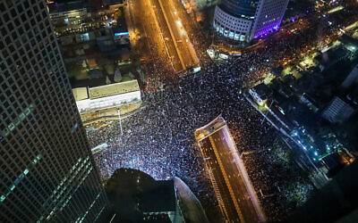 Crowds estimated at over 100,000 protest against the government's proposed sweeping changes to the judicial system, in Tel Aviv on January 21, 2023. (Flash90)