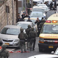 Police at the scene of a terror shooting attack near Jerusalem's Old City, on January 28, 2023. (Yonatan Sindel/Flash90)