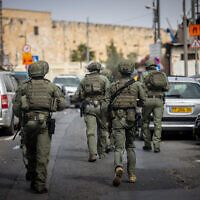 Security forces at the scene of a terror attack near Jerusalem's Old City on January 28, 2023. (Yonatan Sindel/Flash90)