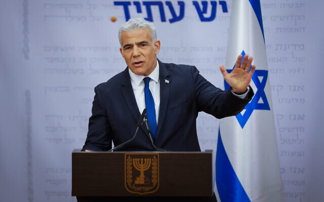 Opposition leader Yair Lapid speaks during a faction meeting of Yesh Atid party, at the Knesset in Jerusalem, on January 30, 2023. (Olivier Fitoussi/ Flash90)