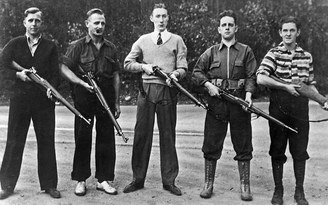 Members of the Christian Front pose with rifles in the 1940s (public domain)