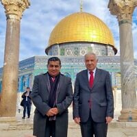 Lord Tariq Ahmad, the UK minister for the Middle East region, left, stands in front of the Dome of the Rock on the Temple Mount in Jerusalem on January 12, 2022. (Twitter/used in accordance with Clause 27a of the Copyright Law)