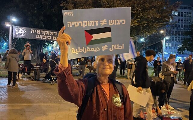 Ziva Weiler speaks to The Times of Israel from an anti-government protest in Tel Aviv. (Carrie Keller-Lynn/Times of Israel)