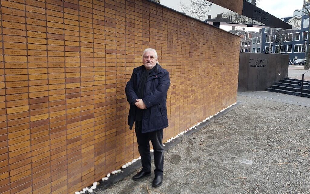 'Holocaust Namenmonument' founder Jacques Grishaver at the memorial, Amsterdam, December 27, 2022 (Matt Lebovic/Times of Israel)