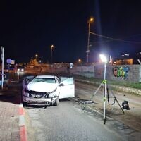A car damaged in an explosion that injured two men in Netanya, January 8, 2023. (Israel Police)