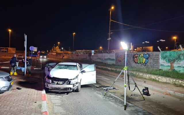 A car damaged in an explosion that injured two men in Netanya, January 8, 2023. (Israel Police)