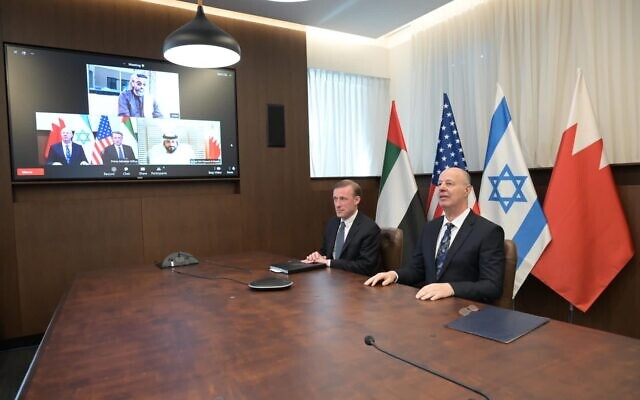 Israeli and US National Security Advisers Tzahi Hanegbi (right) and Jake Sullivan speak with their UAE and Bahrain counterparts via video from Jerusalem on January 19, 2023. (Kobi Gideon/GPO)