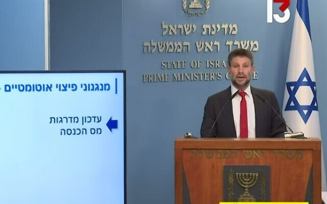 Finance Minister Bezalel Smotrich presents the government's economic plan on January 11, 2023 (Screencapture/Channel 13)