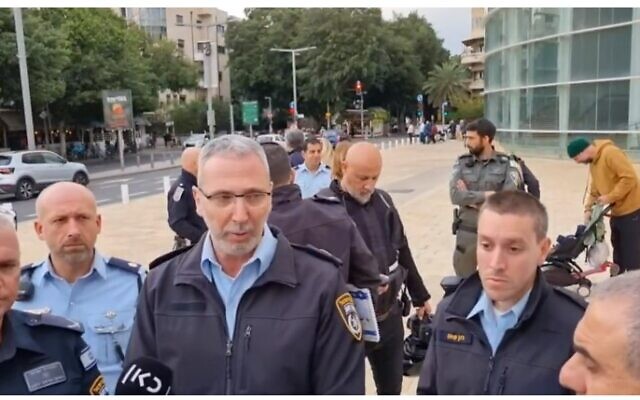 Deputy Commissioner Ami Eshed, the chief of Israel Police's Tel Aviv precinct, speaks to reporters at Habima Square, ahead of major anti-government rallies, January 14, 2023. (Screenshot Ynet; used in accordance with Clause 27a of the Copyright Law)