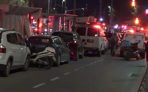 Security forces at the scene of a deadly terror shooting attack in Jerusalem's Neve Yaakov neighborhood, January 27, 2023 (video screenshot)