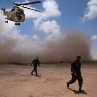 Illustrative: A helicopter flies over at the end of the African Lion military exercise, in Tantan, south of Agadir, Morocco, June 18, 2021. (AP Photo/Mosa'ab Elshamy)