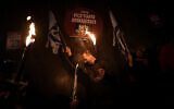 Anti-government protesters in Tel Aviv, January 14, 2023. (AP Photo/Oded Balilty)