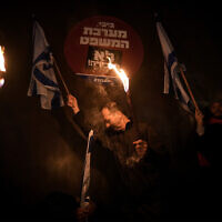 Anti-government protesters in Tel Aviv, January 14, 2023. (AP Photo/Oded Balilty)