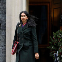 Britain's Home Secretary Suella Braverman leaves after a Cabinet meeting in Downing Street in London, December 13, 2022. (AP Photo/Kirsty Wigglesworth)