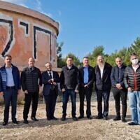 Right-wing MKs, including former Knesset speaker Yuli Edesltein, visit the illegal settlement outpost of Homesh in 2022. (Roi Hadi)
