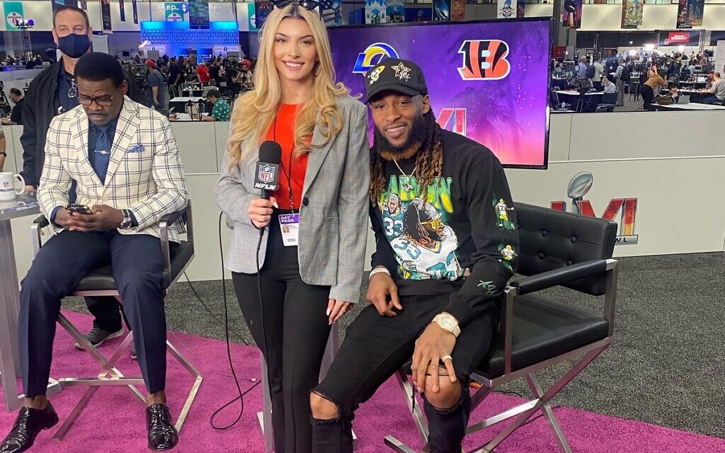 Emily Austin interviewing NFL star Aaron Jones of the Green Bay Packers at the Super Bowl in Los Angeles in February 2022. (Courtesy)