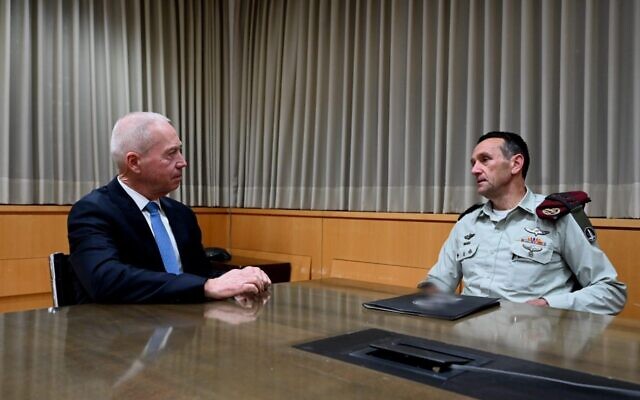 Defense Minister Yoav Gallant (left) meets with IDF Chief of Staff Herzi Halevi at military headquarters in Tel Aviv on January 16, 2023. (Ariel Hermoni/Defense Ministry)