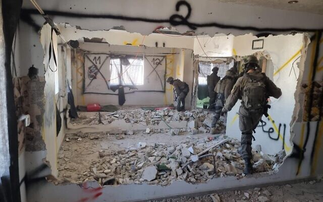 Police demolish the home of a Palestinian gunman in the Shuafat refugee camp, January 25, 2023. (Israel Police)