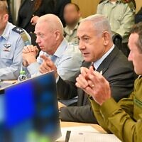 From right, IDF Chief of Staff Herzi Halevy, Prime Minister Benjamin Netanyahu and Defense Minister Yoav Gallant observe a joint US, Israeli military exercise at the Air Force command center (Kobi Gideon/GPO)