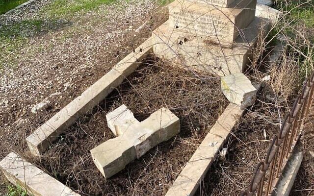 Damaged tombstones at the Protestant Mount Zion Cemetery, in Jerusalem, January 3, 2022. (Israel Police)
