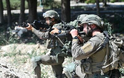 Israeli troops are seen wearing a new combat uniform, set to be distributed to all of the IDF's Ground Forces, in an image published by the IDF on January 5, 2023. (Israel Defense Forces)